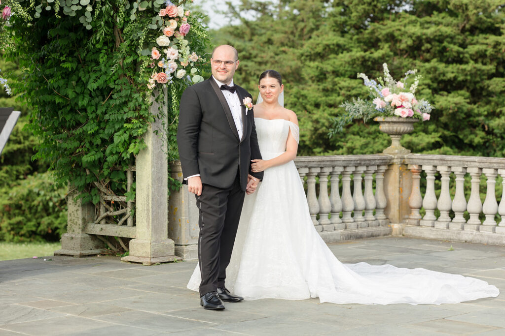Bride and groom standing at the altar during an oceanfront ceremony at Castle Hill Inn in Newport, Rhode Island