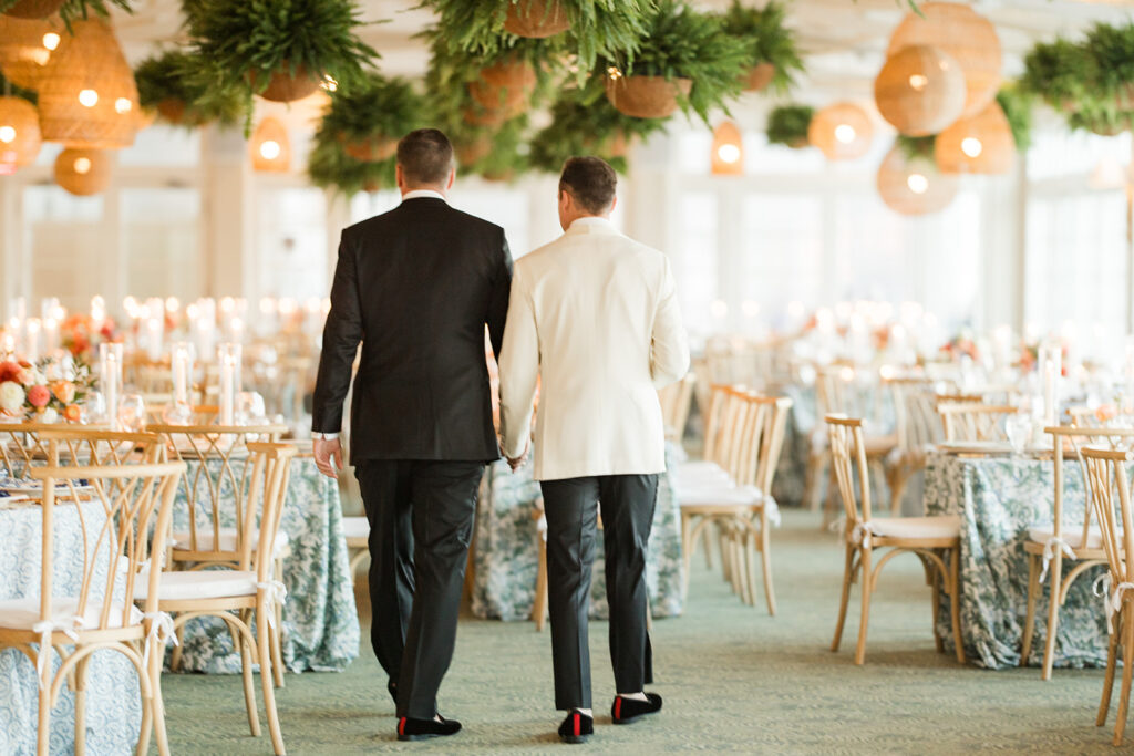 Couple walking through reception space at The Dunes Club in Narragansett Rhode Island