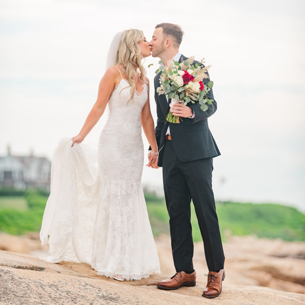 bride and groom walking together during The Towers wedding in Narragansett Rhode Island