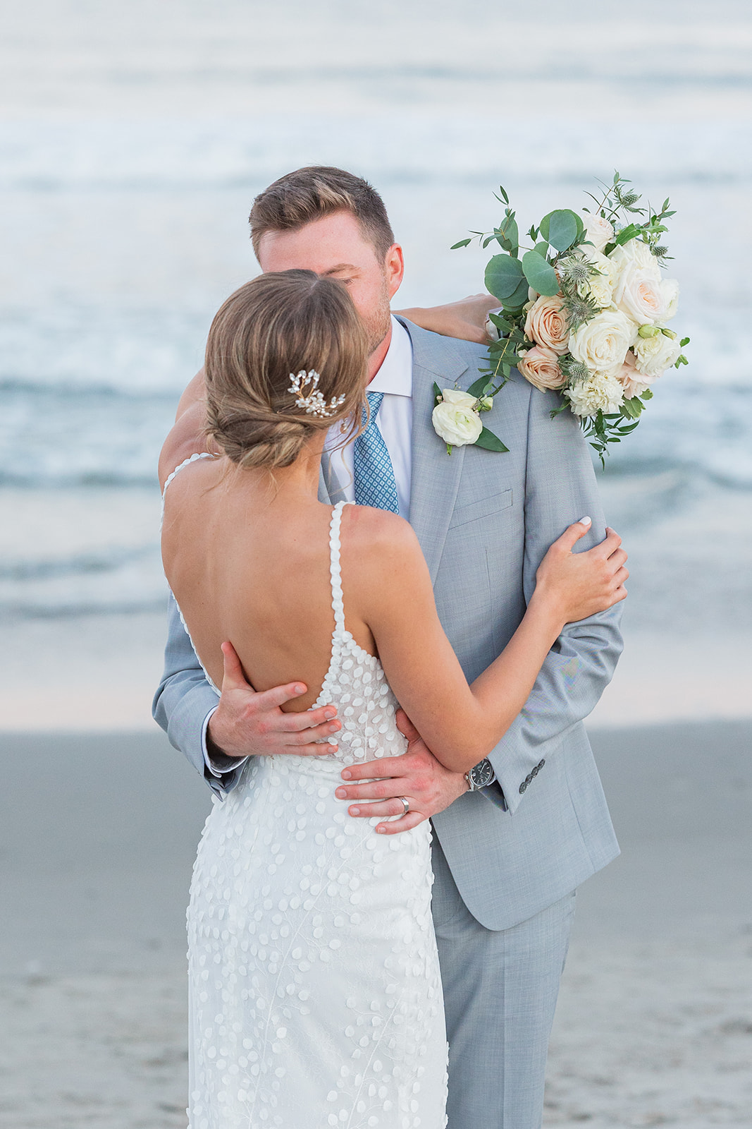 Newport Rhode Island beach wedding portrait of bride and groom at sunset