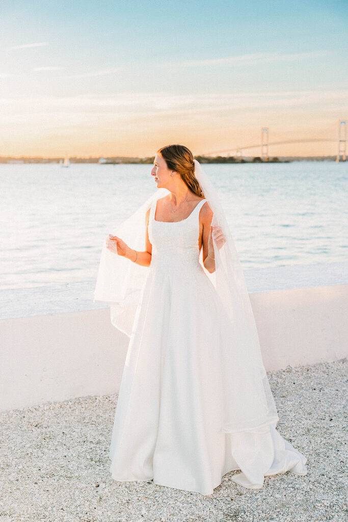 Bride portrait overlooking Narragansett Bay at sunset at Belle Mer