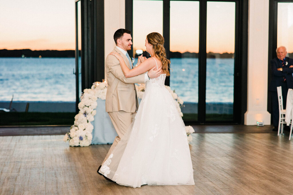  Bride and groom dancing together during Belle Mer reception