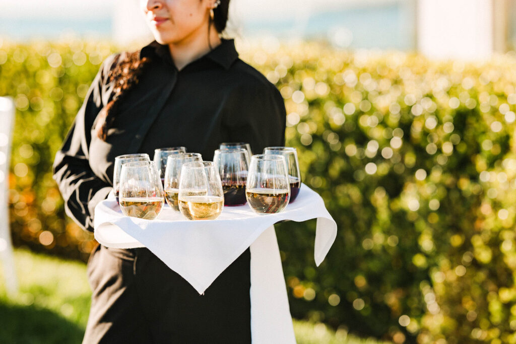 Passed champagne and cocktails during waterfront cocktail hour at Belle Mer