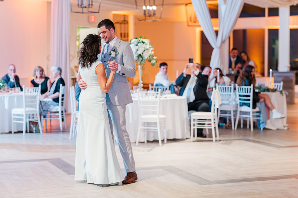 Emotional mother-son dance during wedding reception at Newport Beach House