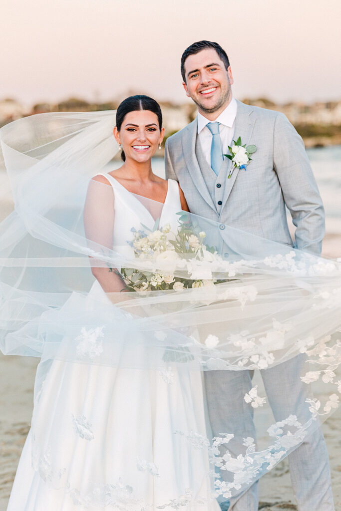 One of the most natural advantages of Newport Beach House is how seamlessly it allows time for portraits along the water. The coastline provides a clean, open backdrop, while the light remains soft and consistent throughout the day, making it easy to create images that feel both refined and genuine. For Kylie and Stephen, this meant stepping into portraits without it feeling like a departure from the day. Everything stayed connected to the overall experience, allowing moments to unfold naturally while still creating images that feel intentional and timeless.