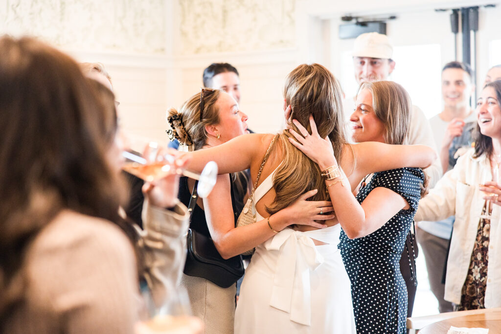 surprise engagement celebration at Celeste in Narragansett Rhode Island with friends and family