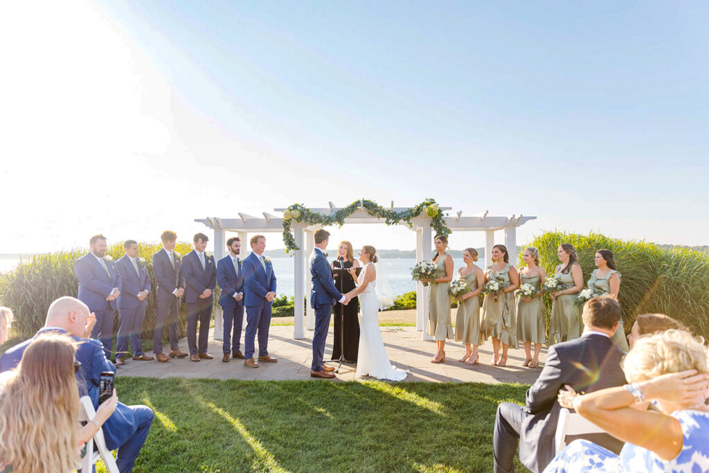 Wide waterfront wedding ceremony at OceanCliff in Newport, Rhode Island