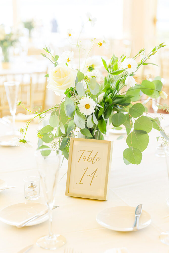 Floral reception table details inside OceanCliff in Newport